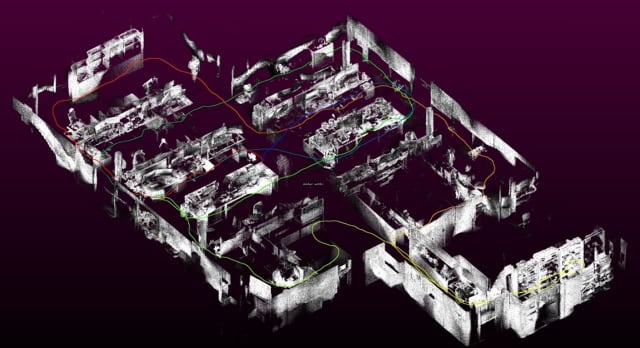 A 3D model of a CSIRO office, with desks and walls shown in grey. Colored lines show the device's trajectory through the office space. This data was captured with Wildcat Simultaneous Localization and Mapping onboard the multi-resolution scanning payload. Credit: CSIRO