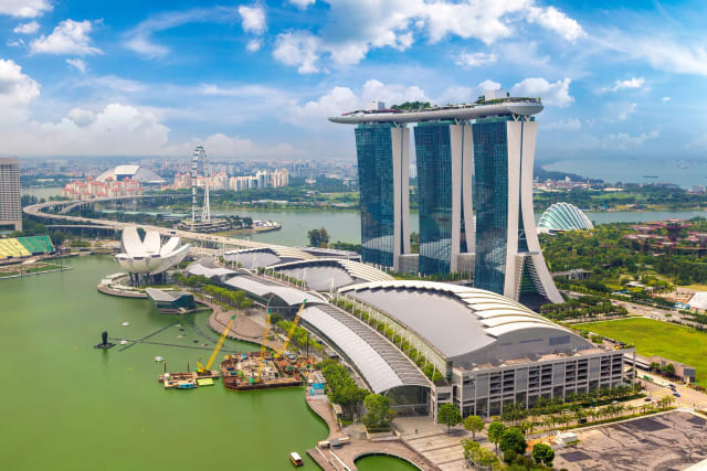 The Marina Bay Sands Hotel towers above the convention center in Singapore Marina Bay, site of the 2023 Year in Infrastructure and Going Digital Awards. (Image: Bentley.)