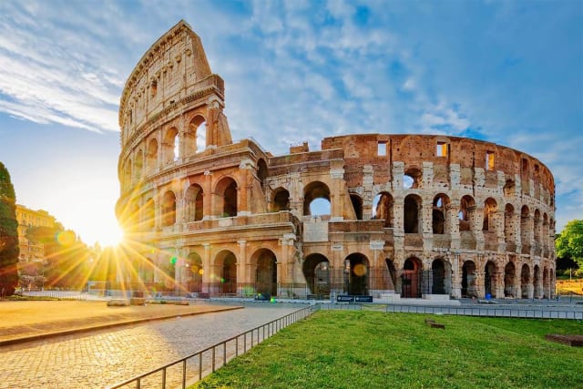 The Colosseum saw many bloody spectacles, but the nearly 2,000-year-old structure is an engineering marvel of limestone and concrete. Stock photo.