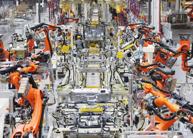 A robot operates in a light truck production line at Beijing Automobile Factory in Jiangshan Town of Laixi city in Qingdao, East China's Shandong province, April 28, 2022. (Stock photo.)