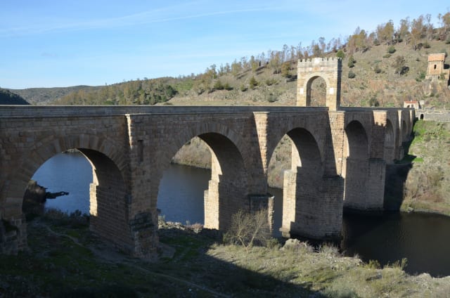 The Alcantara Bridge in Spain is actually open to vehicular traffic. Stock photo.