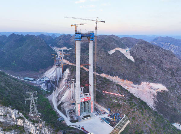 By the time it is finished in 2025, the Huajiang Grand Canyon Bridge will be the highest in the world.