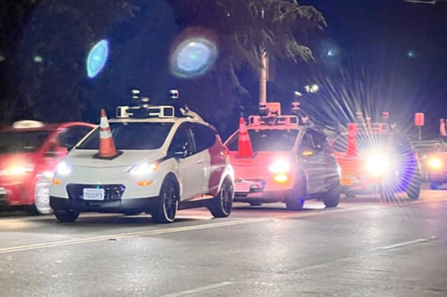 Three self-driving Cruise vehicles are disabled by cones in San Francisco in July 2023. | Source: Courtesy Safe Street Rebel.